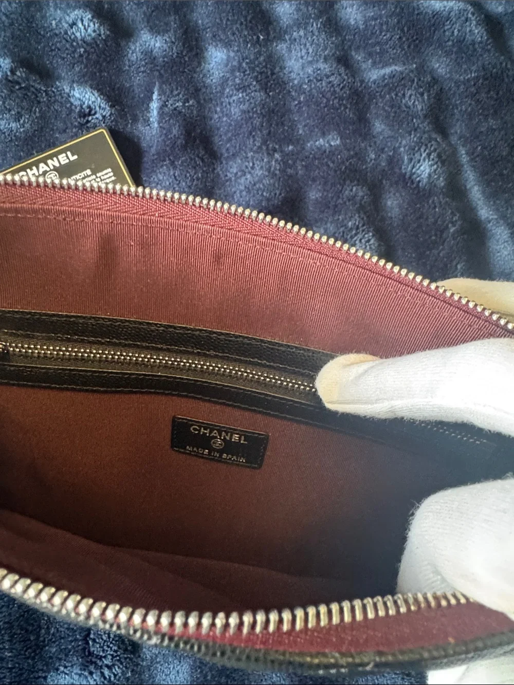 CHANEL Black Quilted Caviar Leather Zip Pouch with Burgundy Trim
